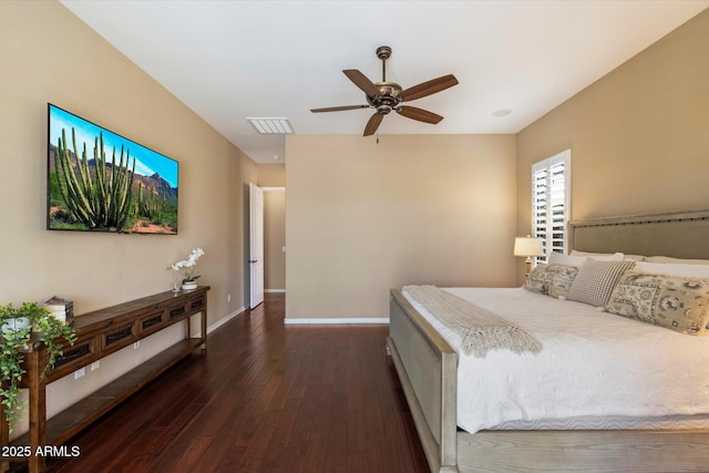 bedroom with baseboards, a ceiling fan, dark wood finished floors, and visible vents