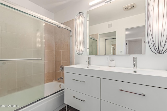 8738 E Vista Dr, Scottsdale, AZ 85250 - bathroom with shower / bath combination with glass door and double vanity