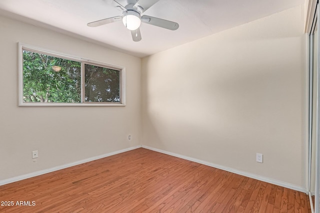 8738 E Vista Dr, Scottsdale, AZ 85250 - unfurnished room with light wood-style flooring and ceiling fan
