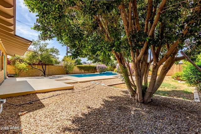 8738 E Vista Dr, Scottsdale, AZ 85250 - fenced backyard featuring a patio
