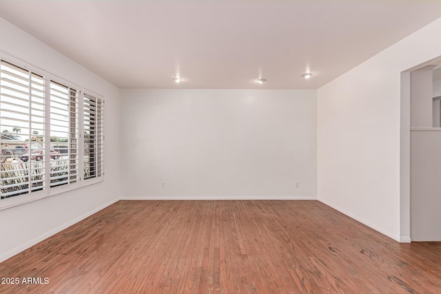 8738 E Vista Dr, Scottsdale, AZ 85250 - spare room with wood finished floors and baseboards