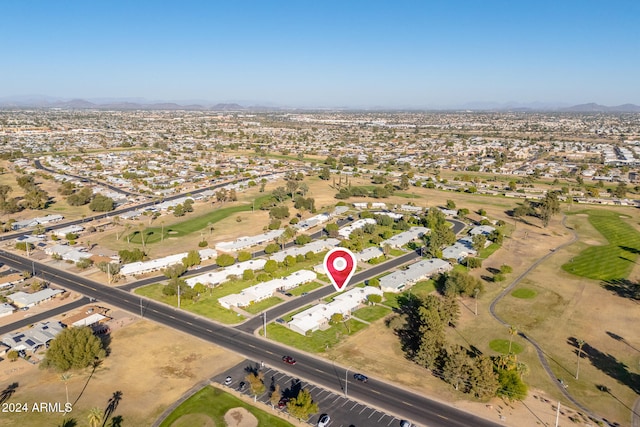 birds eye view of property featuring a mountain view