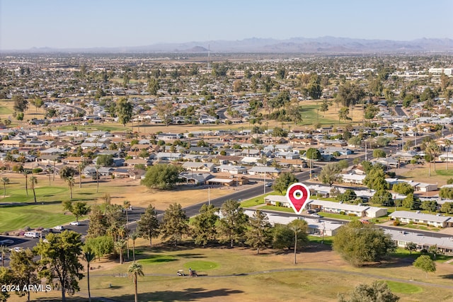 drone / aerial view featuring a mountain view