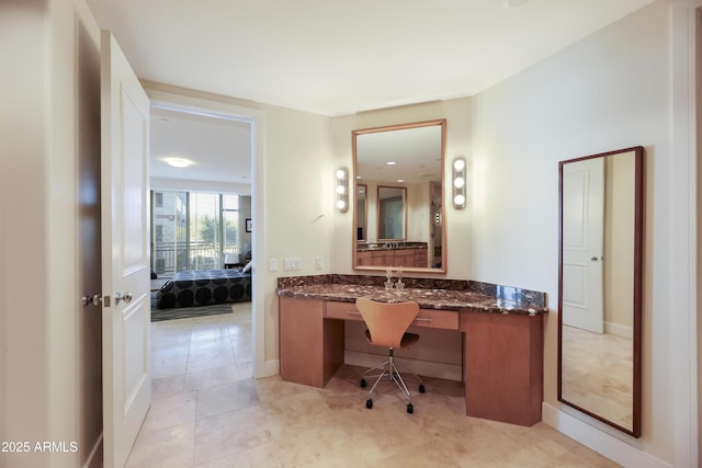 bathroom featuring vanity and tile patterned flooring