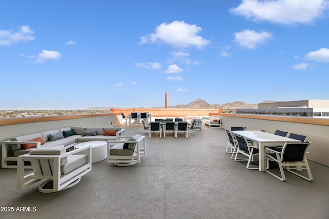 view of patio / terrace featuring a mountain view and outdoor lounge area