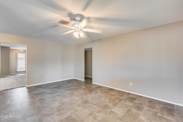 empty room featuring ceiling fan