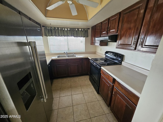 kitchen featuring stainless steel fridge, black range with electric cooktop, ceiling fan, sink, and light tile patterned flooring