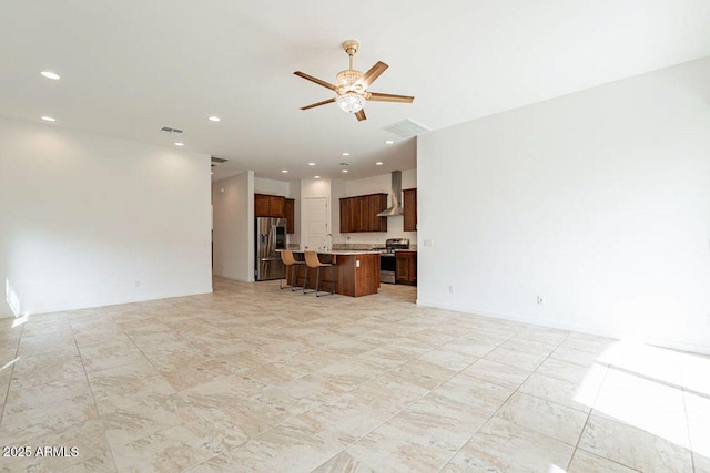 living room with recessed lighting, ceiling fan, and visible vents