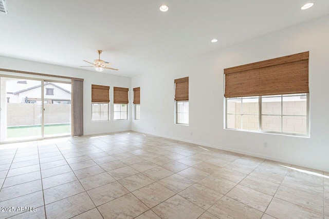 empty room with visible vents, recessed lighting, baseboards, and ceiling fan