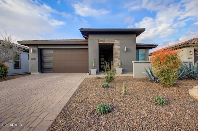 view of front of property with a garage