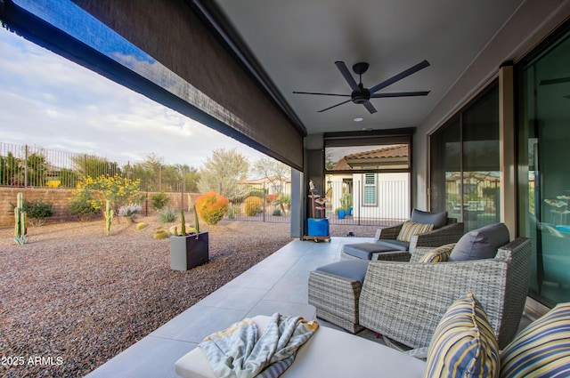 view of patio / terrace with ceiling fan and an outdoor hangout area