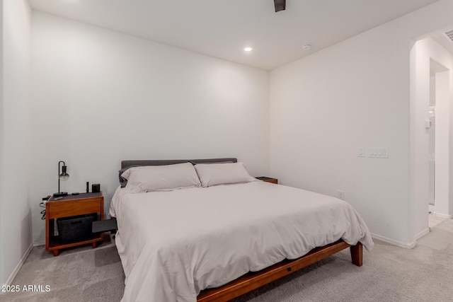 bedroom with light carpet, baseboards, and recessed lighting