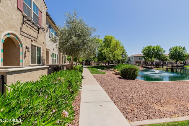 view of property's community featuring a water view