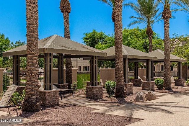 view of patio featuring a gazebo and fence
