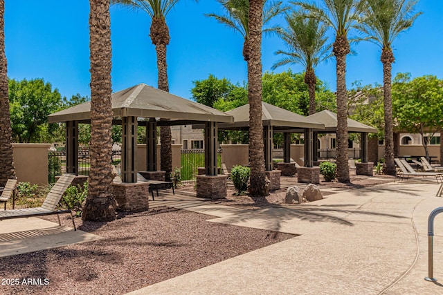 view of home's community with a gazebo and a patio