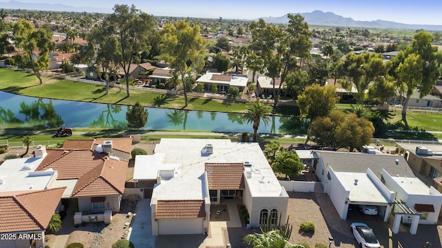 bird's eye view featuring a residential view and a water and mountain view