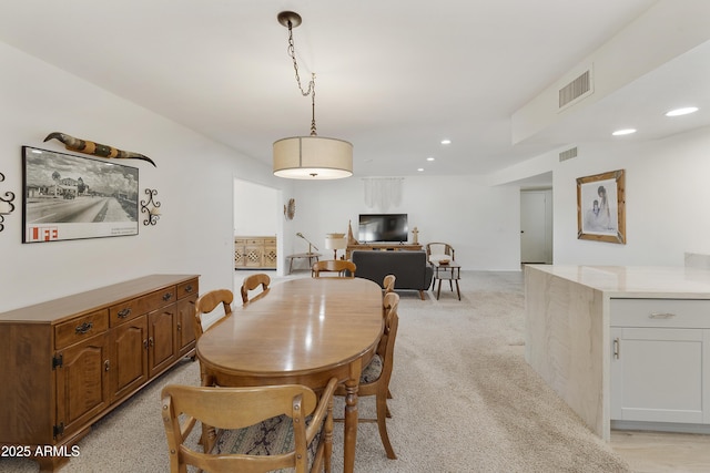 dining area featuring recessed lighting, light carpet, and visible vents