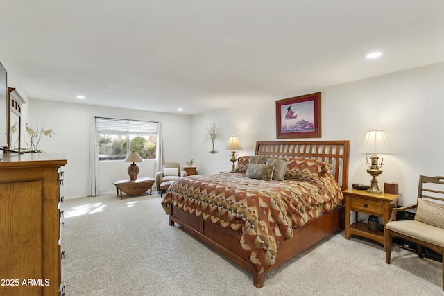 bedroom with recessed lighting and light carpet