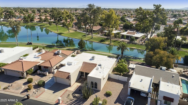 aerial view with a residential view and a water view