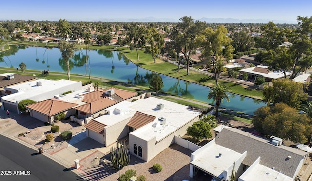 birds eye view of property featuring a residential view and a water view