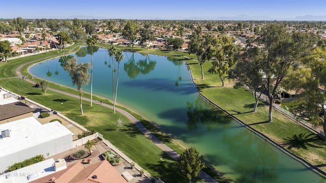 drone / aerial view with a residential view and a water view