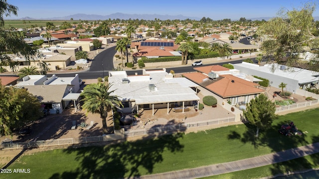 drone / aerial view with a residential view and a mountain view