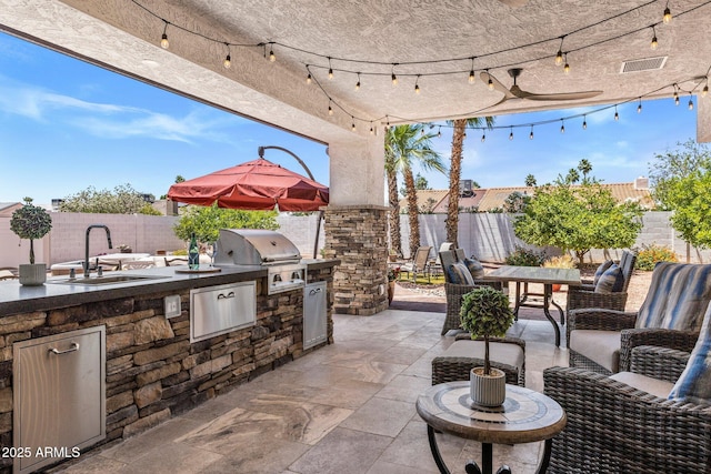 7510 E Larkspur Dr, Scottsdale, AZ 85260 - fenced backyard featuring a sink, outdoor dining area, and a patio