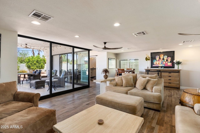 7510 E Larkspur Dr, Scottsdale, AZ 85260 - living room featuring a ceiling fan, wood finished floors, recessed lighting, and baseboards