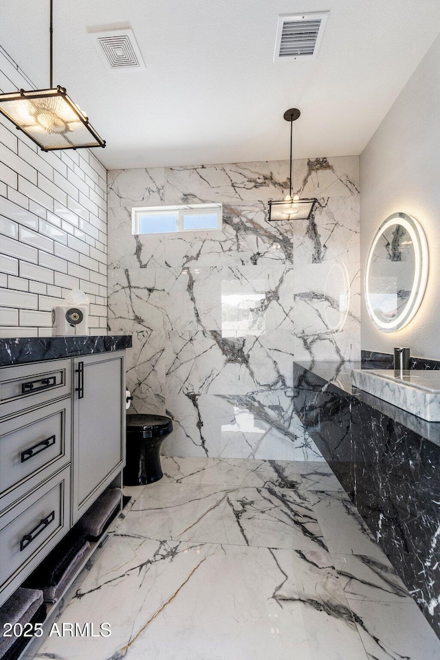 7510 E Larkspur Dr, Scottsdale, AZ 85260 - full bath with vanity, toilet, a marble finish shower, and marble tiled floors