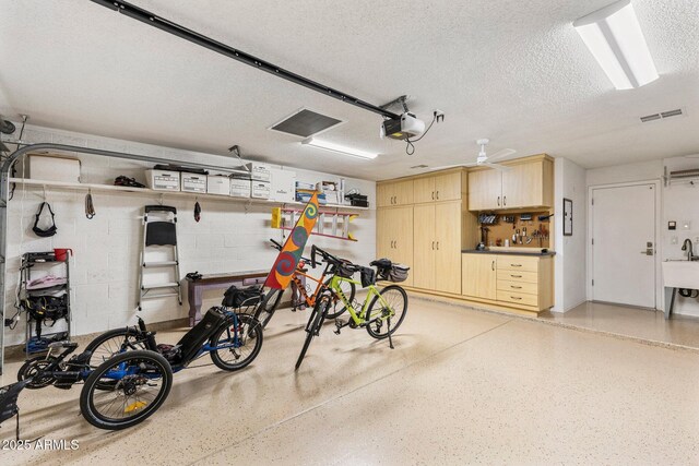 7510 E Larkspur Dr, Scottsdale, AZ 85260 - garage with a garage door opener and concrete block wall
