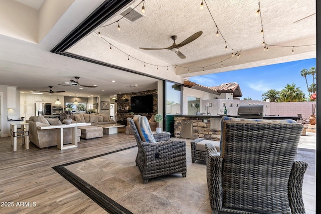 7510 E Larkspur Dr, Scottsdale, AZ 85260 - view of patio featuring a ceiling fan, outdoor lounge area, and a deck