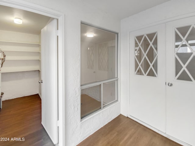 interior space featuring dark wood-type flooring