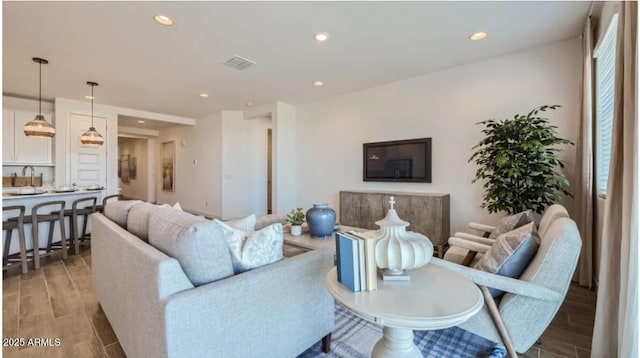 922 W Peralta Pass, Apache Junction, AZ 85120 - living room featuring light wood-type flooring and recessed lighting