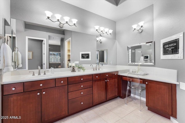 bathroom with vanity and tile patterned flooring