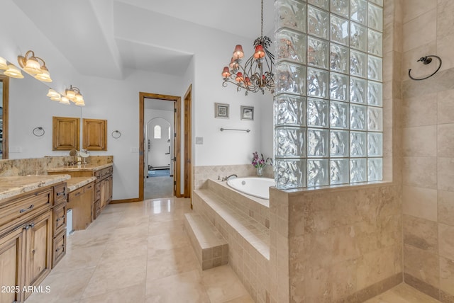 3217 N Piedra Cir, Mesa, AZ 85207 - bathroom featuring a bath, vanity, tile patterned flooring, a chandelier, and walk in shower