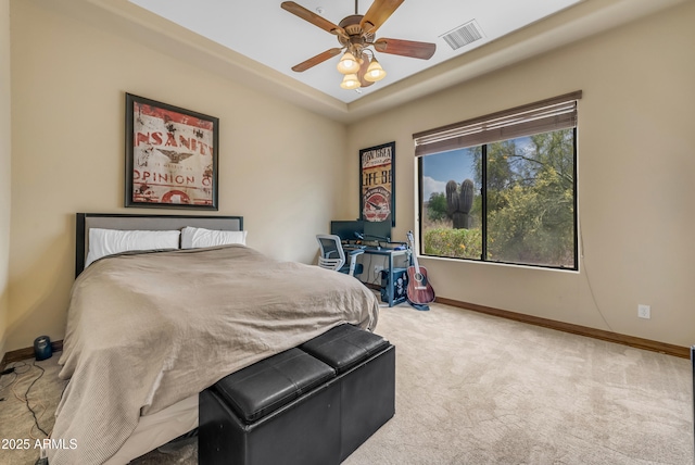 3217 N Piedra Cir, Mesa, AZ 85207 - bedroom featuring baseboards, carpet, a ceiling fan, and a tray ceiling