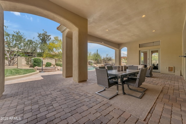 3217 N Piedra Cir, Mesa, AZ 85207 - view of patio featuring french doors, outdoor dining space, and fence