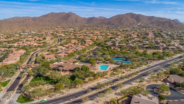 3217 N Piedra Cir, Mesa, AZ 85207 - view of property location featuring a mountain backdrop, a pool area, and nearby suburban area