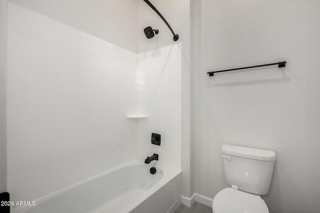 bathroom with shower / bath combination and toilet