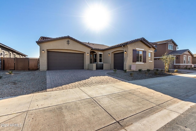 view of front of home with a garage