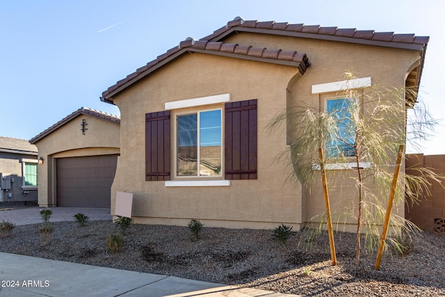 view of home's exterior featuring a garage