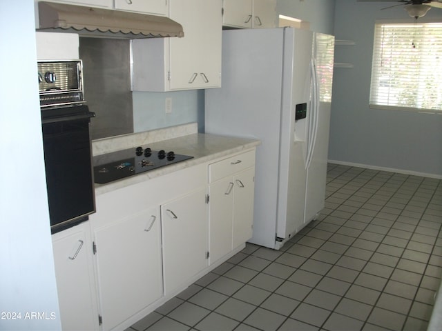 kitchen featuring black appliances, white cabinetry, light tile patterned floors, and ceiling fan