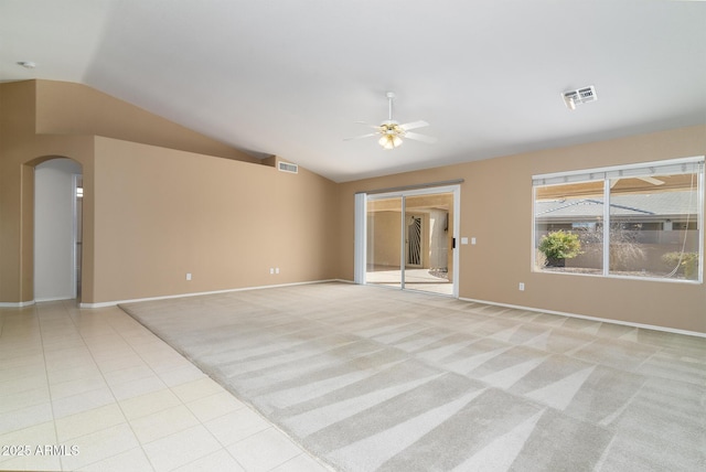 interior space with vaulted ceiling and ceiling fan