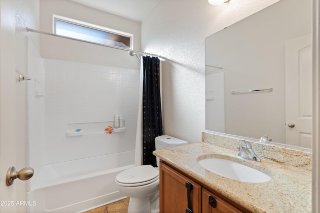 full bathroom featuring tile patterned floors, vanity, shower / tub combo, and toilet