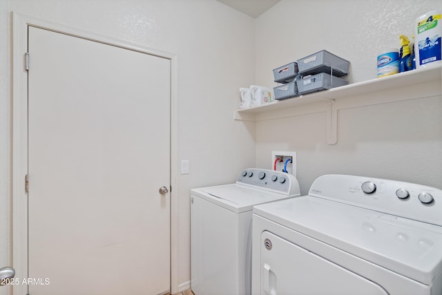 laundry area featuring independent washer and dryer