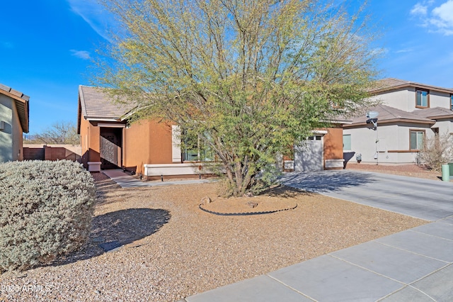 view of property hidden behind natural elements