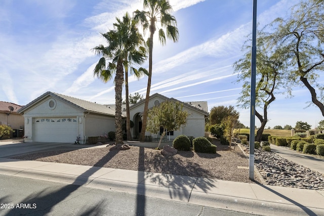 view of front of home with a garage