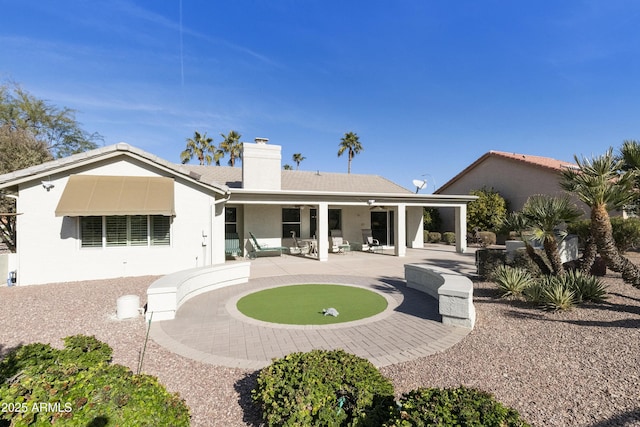 back of house featuring a patio