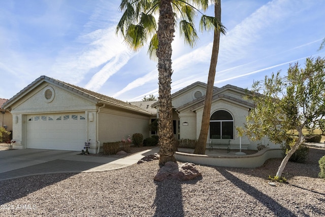 single story home featuring a garage