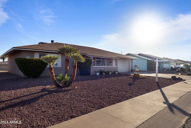 ranch-style house with a garage